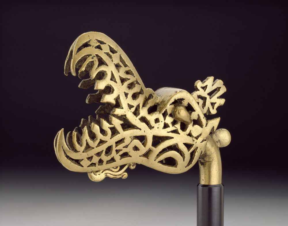 Calligraphic Finial in the Shape of a Dragon Golconda (India), late 17th–early 18th century, Brass, 18 x 10.7 cm Purchased, 1994. Ashmolean Museum (EA1994.45) © Ashmolean Museum, University of Oxford 