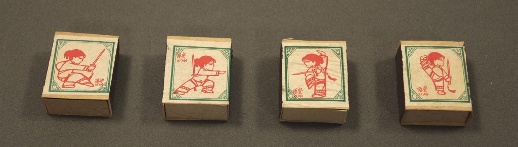 Four matchboxes with small girls practicing martial arts, EA2010.95